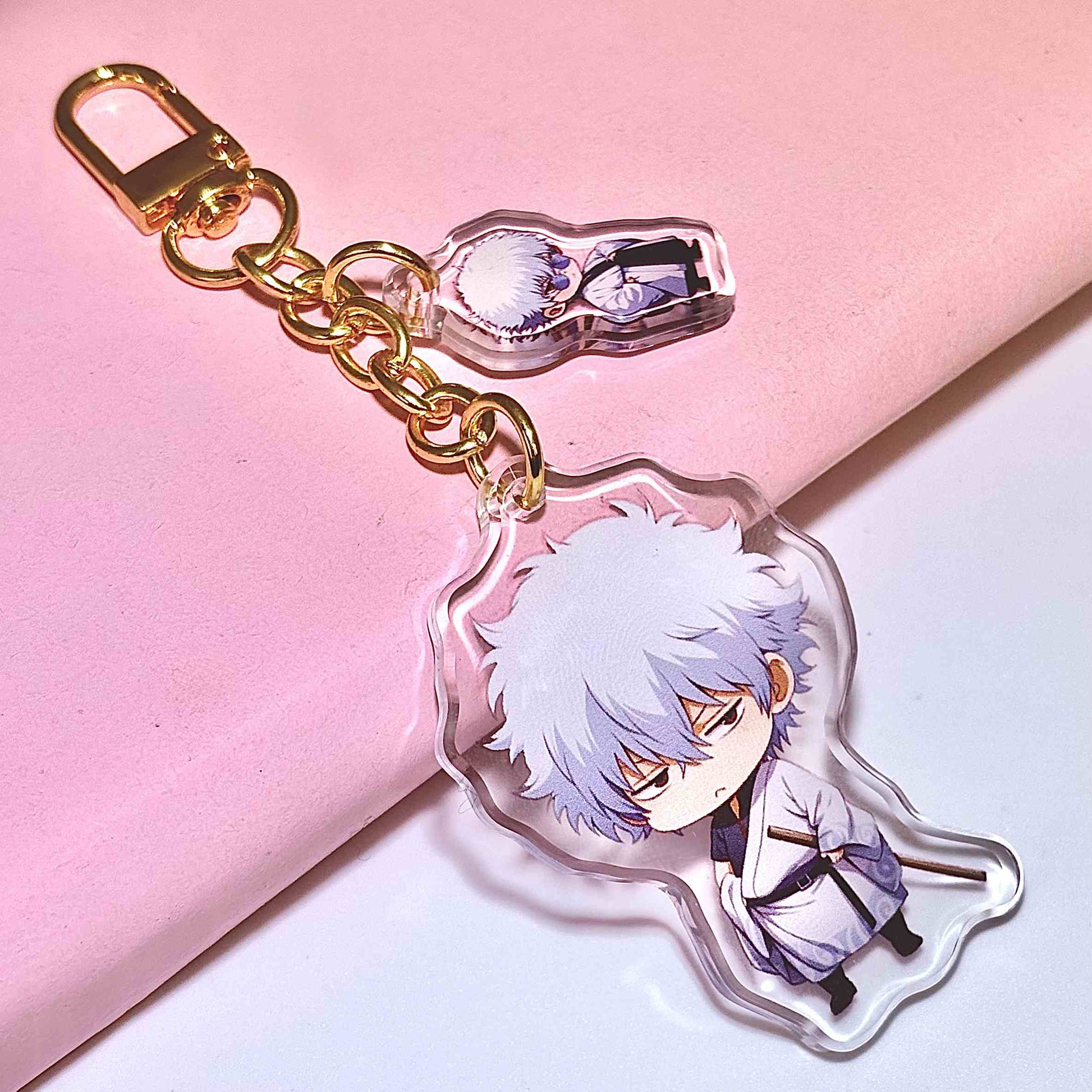 between the lines obsessive bottom acrylic keychain